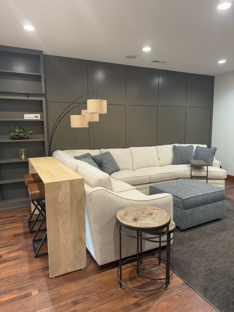 Living room with a textured accent wall.